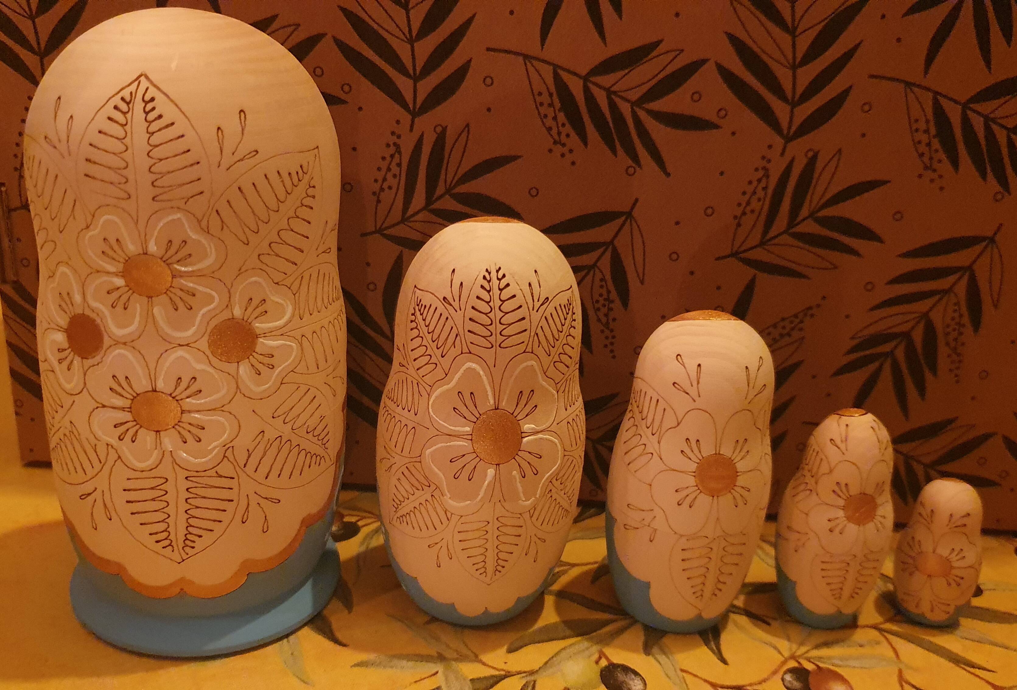 Matryoshka pyrography dolls