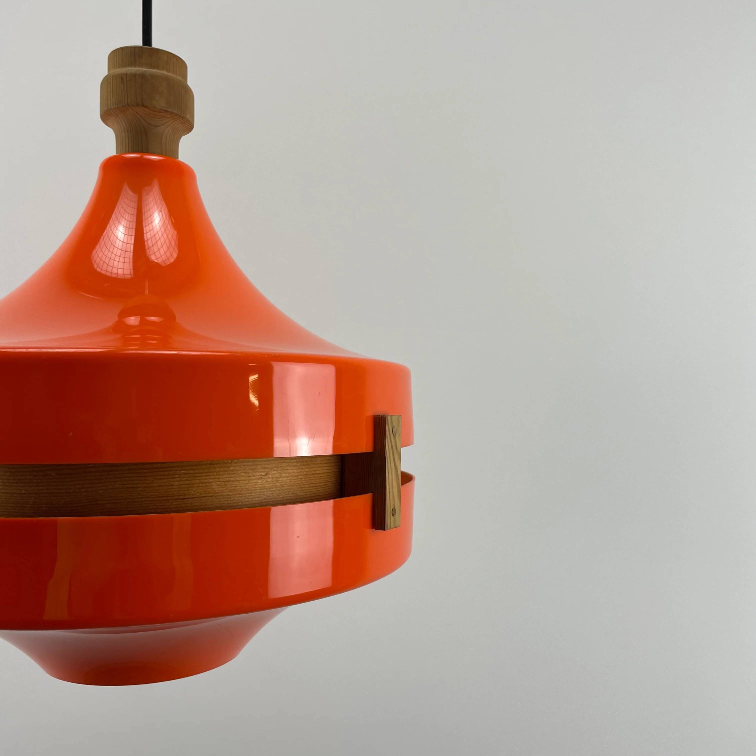 1970s orange Scandinavian suspension light in plexiglass shaped like a UFO.