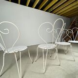 4 vintage wrought iron chairs