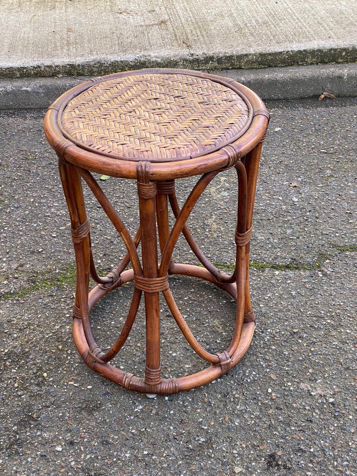 Vintage round stool in bamboo, rattan, and wicker.