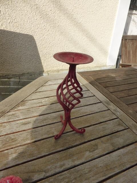 Twisted, patinated wrought iron candlestick red vintage, with pink rose candles