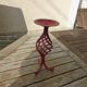Twisted, patinated wrought iron candlestick red vintage, with pink rose candles
