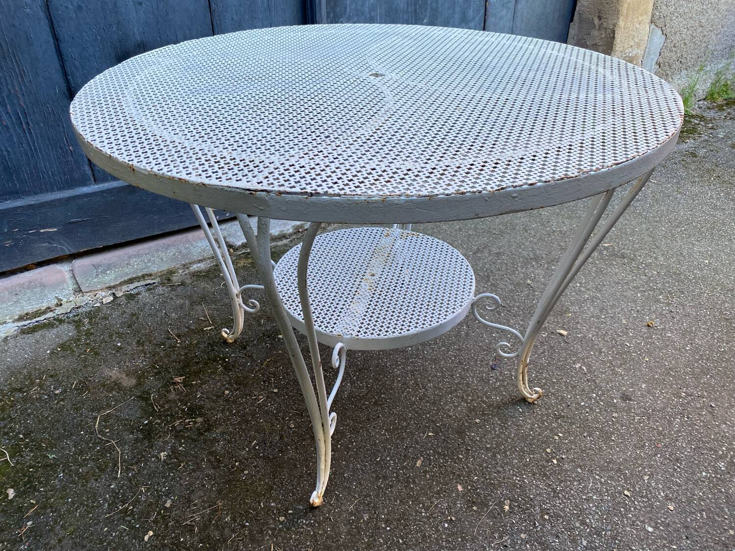 White lacquered perforated metal garden table circa 1950