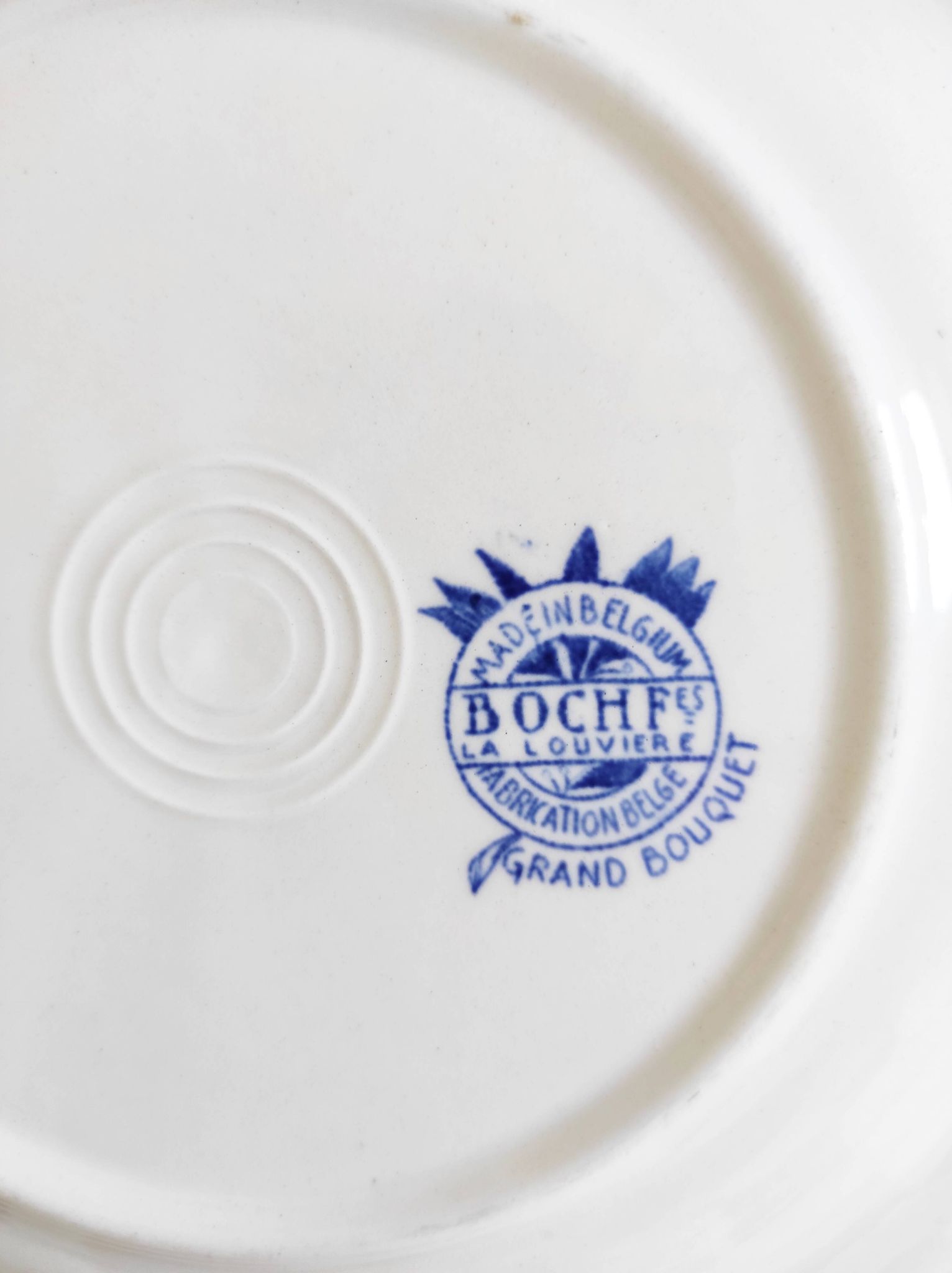 Boch Frères deep plate with large bouquet decoration