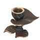 Patinated green brass candlestick with foliage decoration.