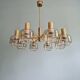 Large designer chandelier in brass and smoked glass globes, 1970s
