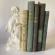 Serre-livres en plâtre, fillette au panier