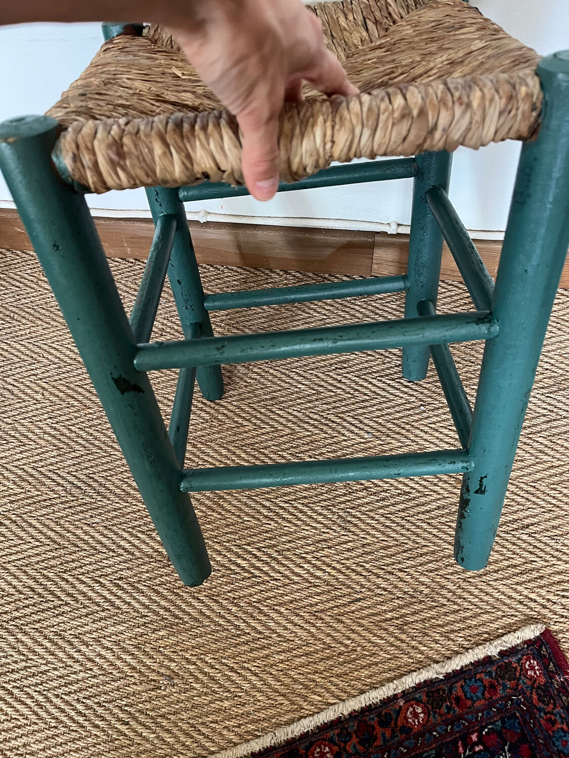 Vintage stool in green patinated wood and straw