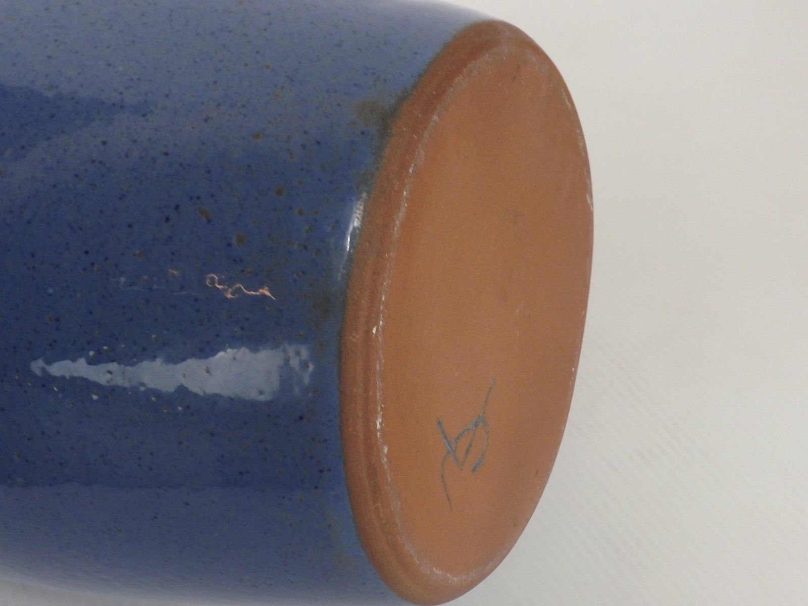 Signed enamelled terracotta bottle vase