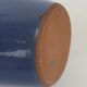 Signed enamelled terracotta bottle vase