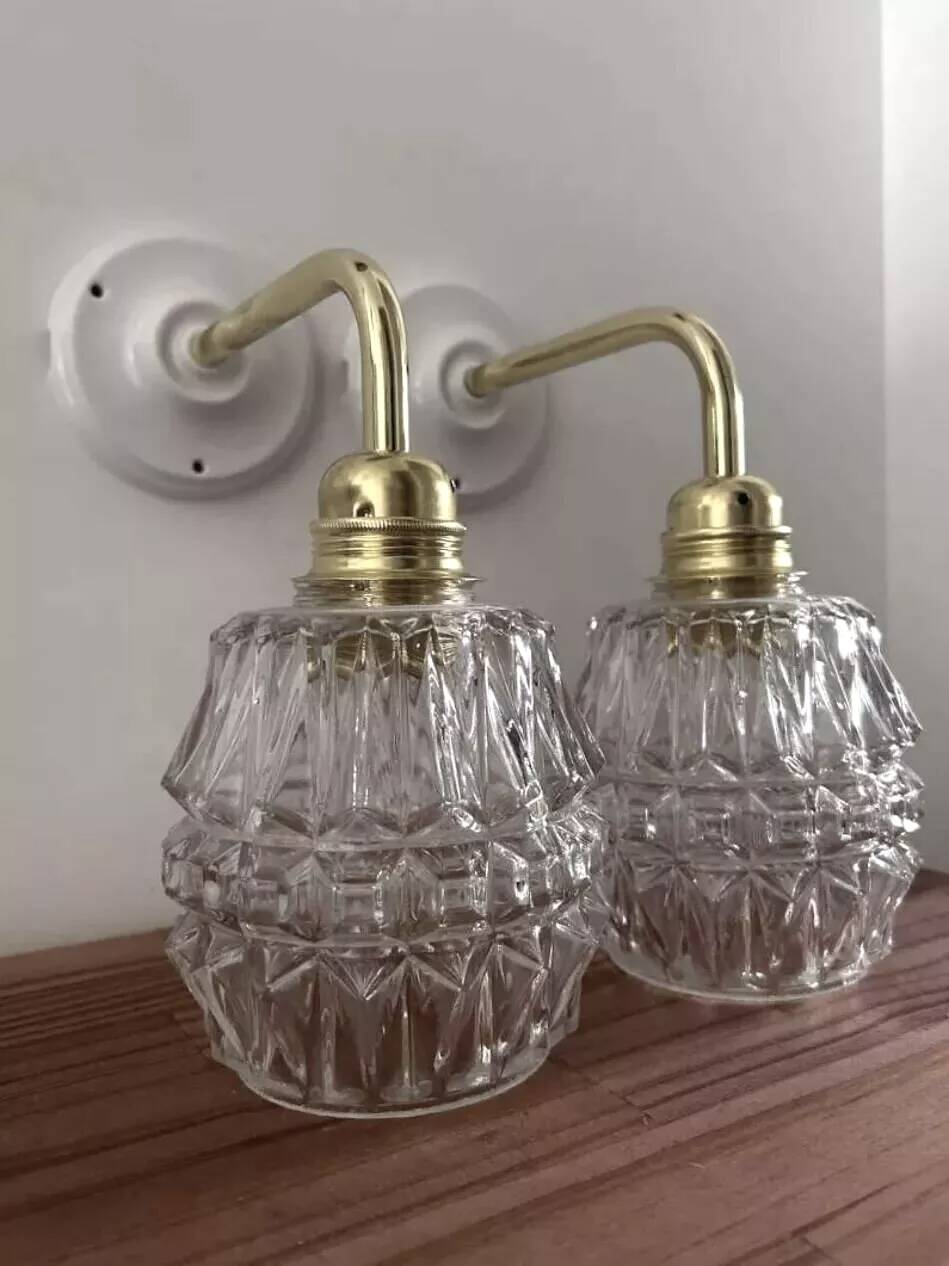 Pair of ceramic and glass wall sconces