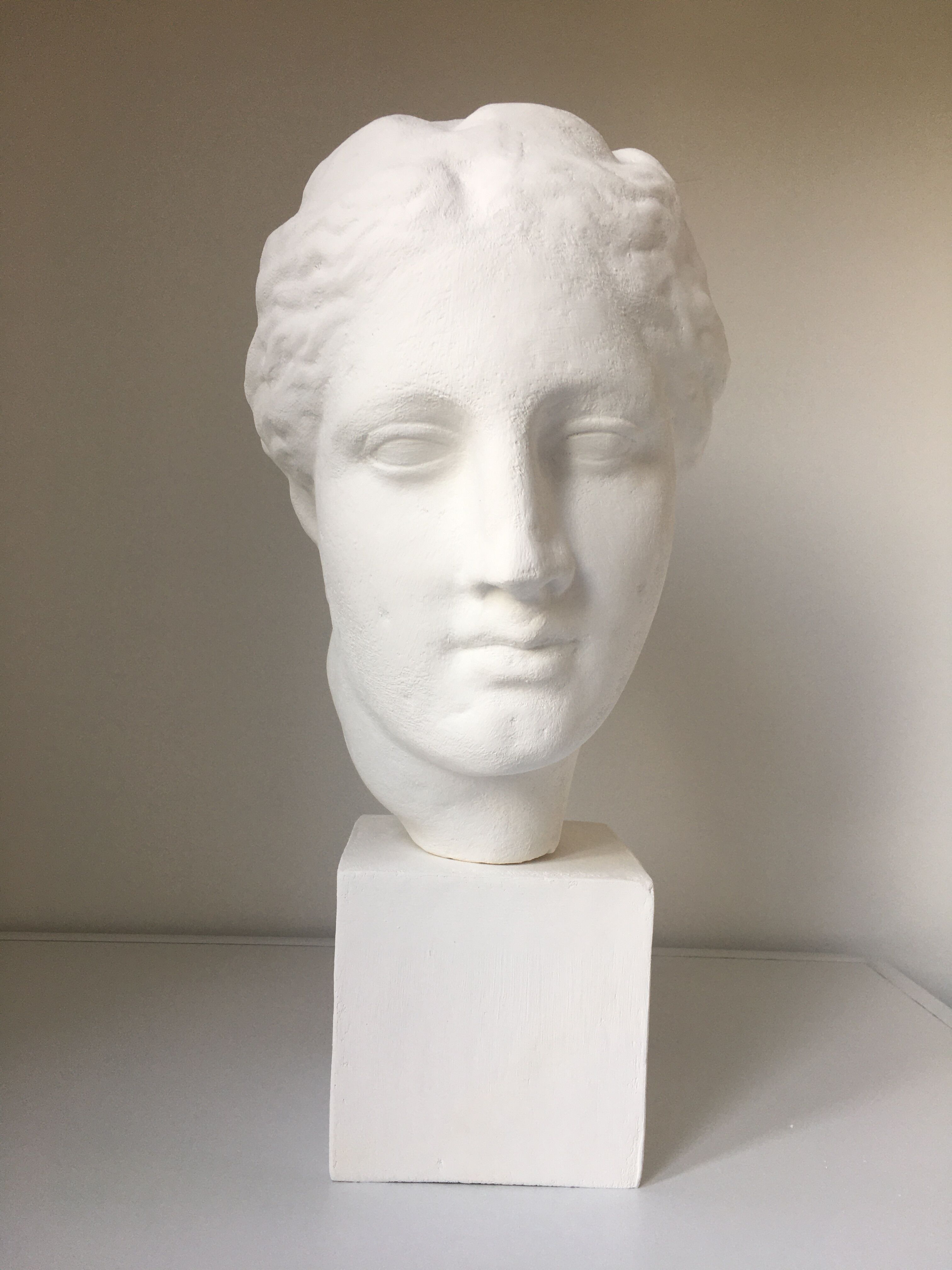 Greek Ap Hygie head. Scopas Hellenistic Greek art in plaster-bleached terracotta