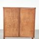 Antique Dutch oak display cabinet with glass shelves and a mirrored back