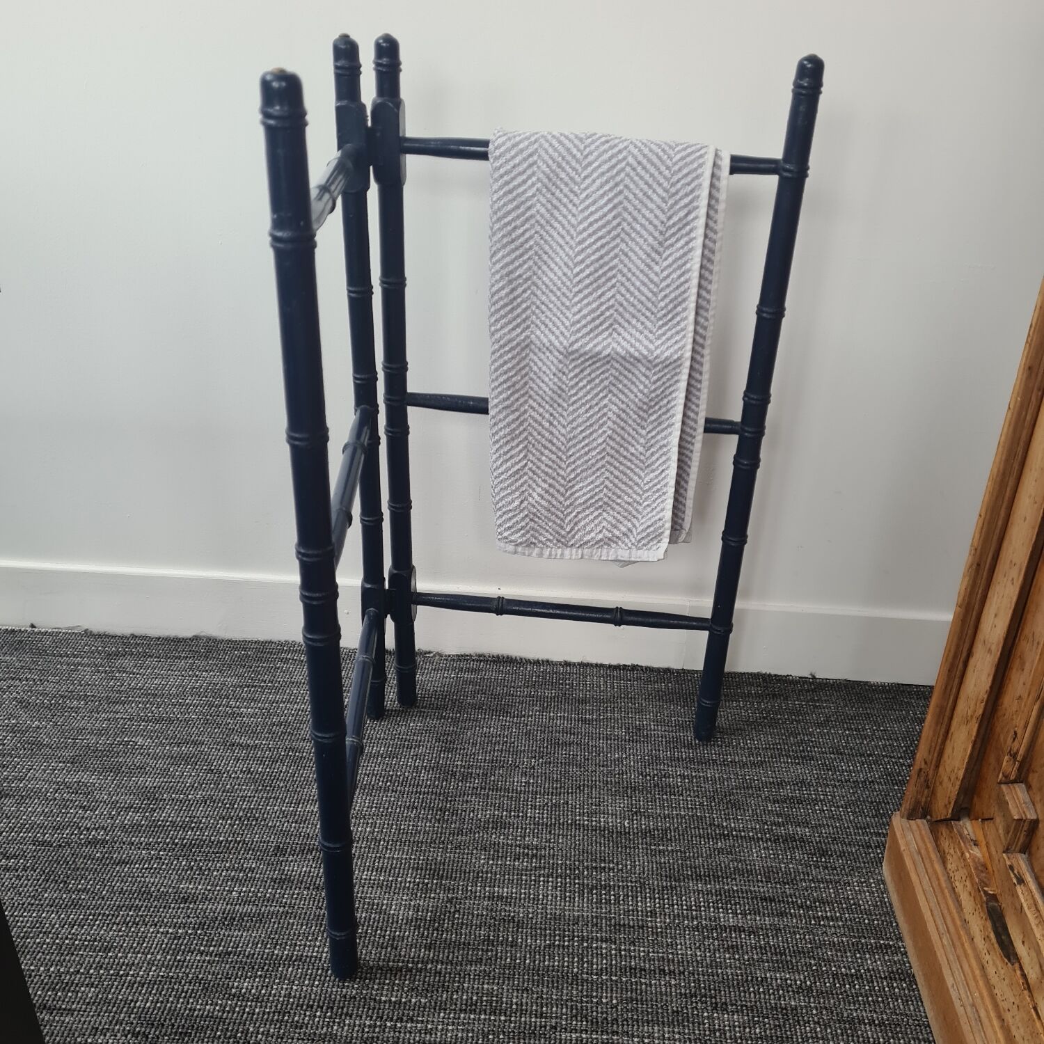 Wooden towel rail painted navy blue