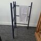 Wooden towel rail painted navy blue