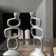 Pair of aluminum candlesticks