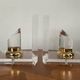 Vintage pair of bookends in lucite and brass from the 1970s.
