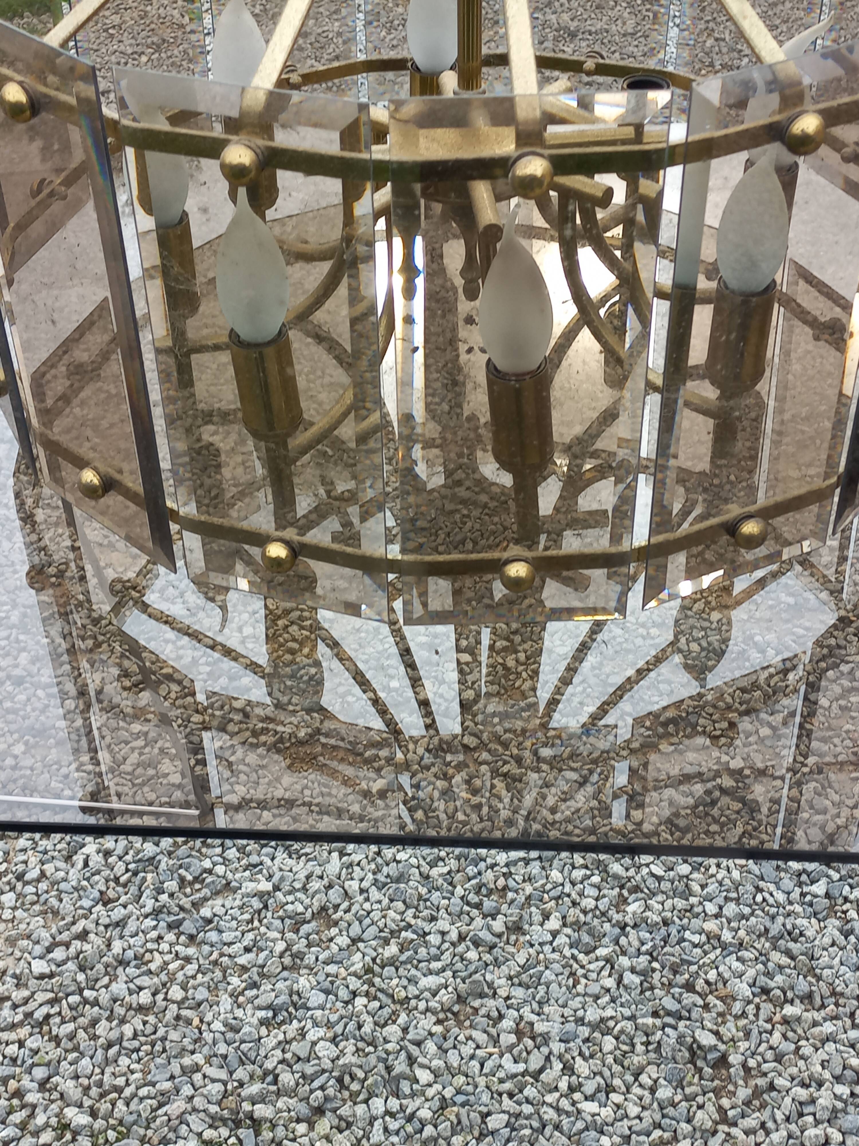 70s designer chandelier with smoked glass plates and gold metal frame