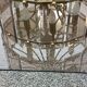 70s designer chandelier with smoked glass plates and gold metal frame