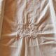 Old monogrammed fabric