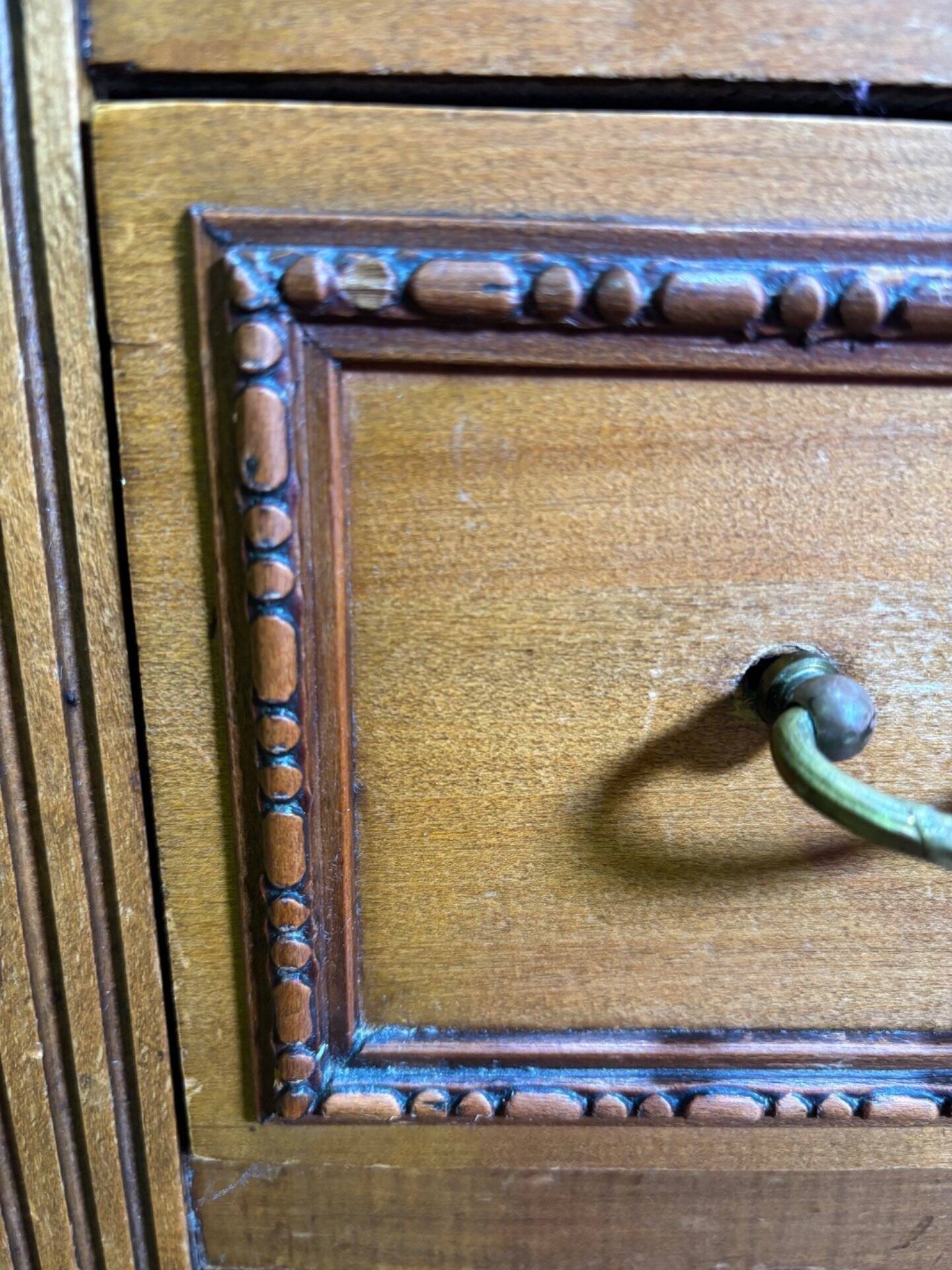 Louis XVI style molded and carved walnut chest of drawers