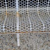 Garden bench in iron and perforated sheet metal