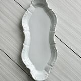 white porcelain plate in an unusual shape