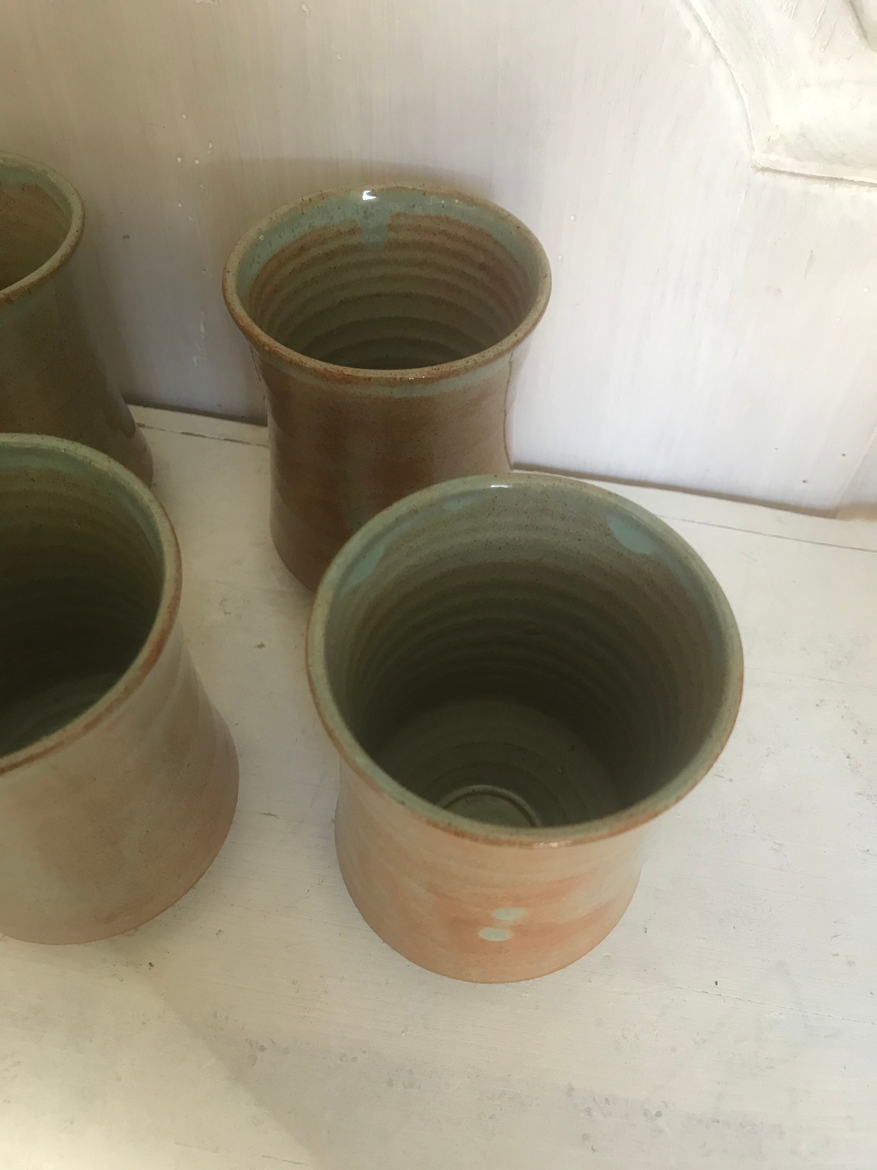 Pitcher and its vintage sandstone glasses