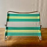 Vintage folding beach chair in chrome metal and woven plastic