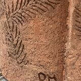 Large chamotte clay lamp in brutalist style, with a plant motif.