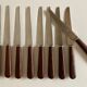 Set de 9 couteaux à manche de bois de palissandre mid century