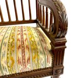 Old Louis XVI style armchair with wide seat