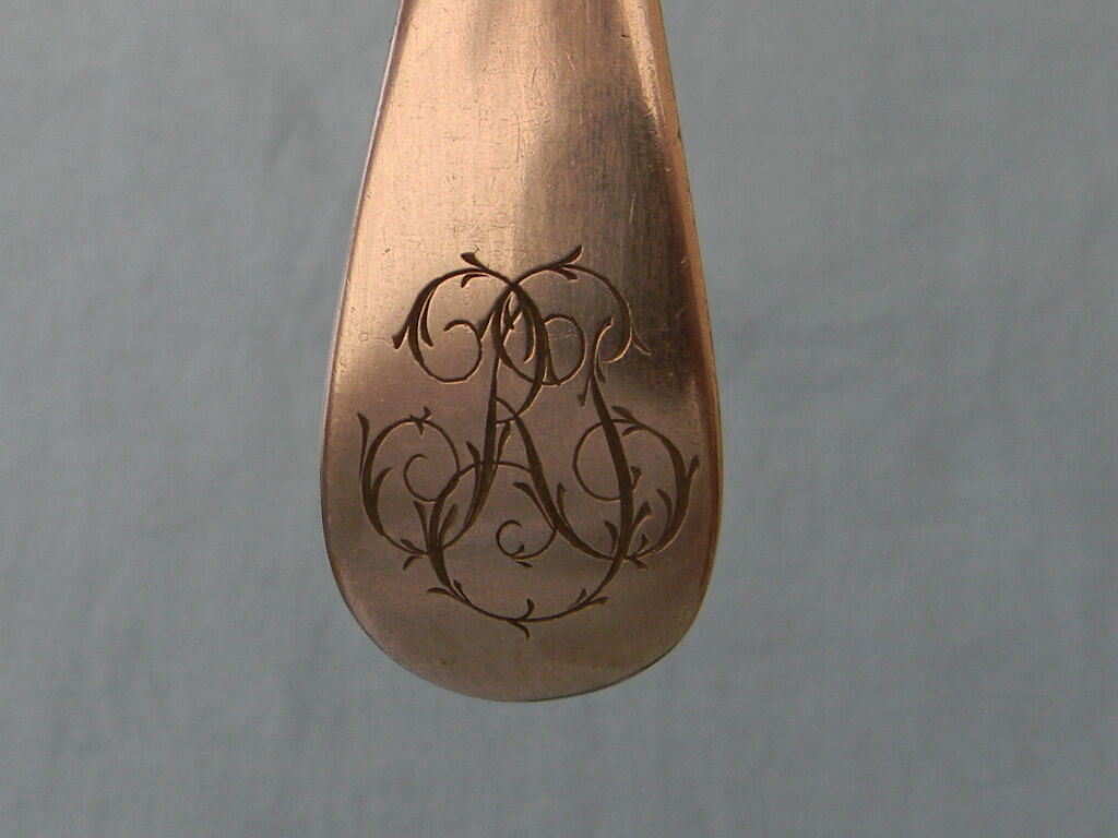Set of 6 silver metal dessert spoons.