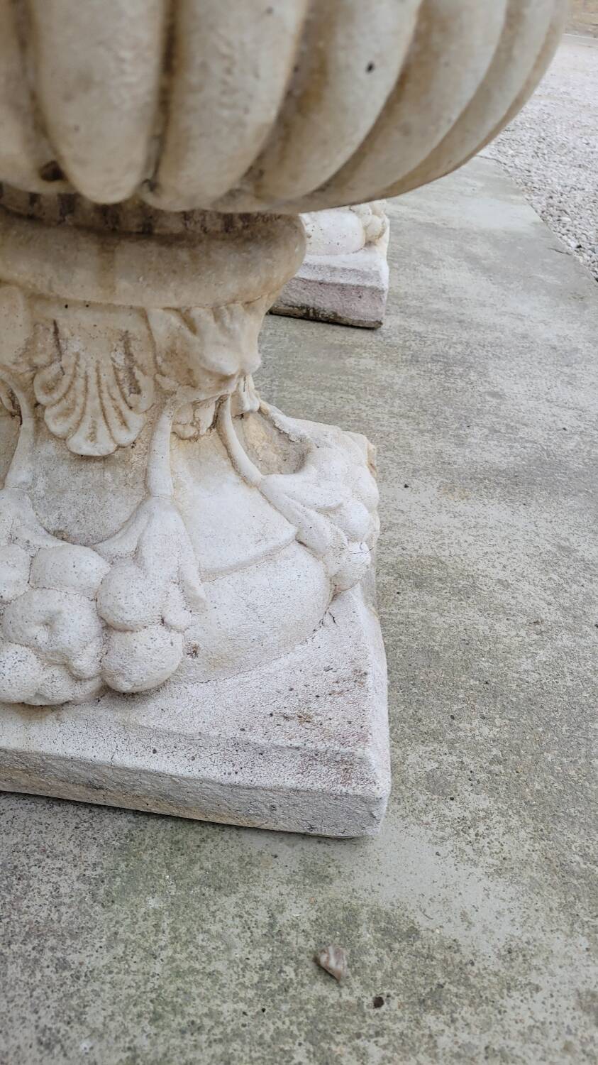 Pair of planter vases decorated with faces in reconstituted stone 1950s