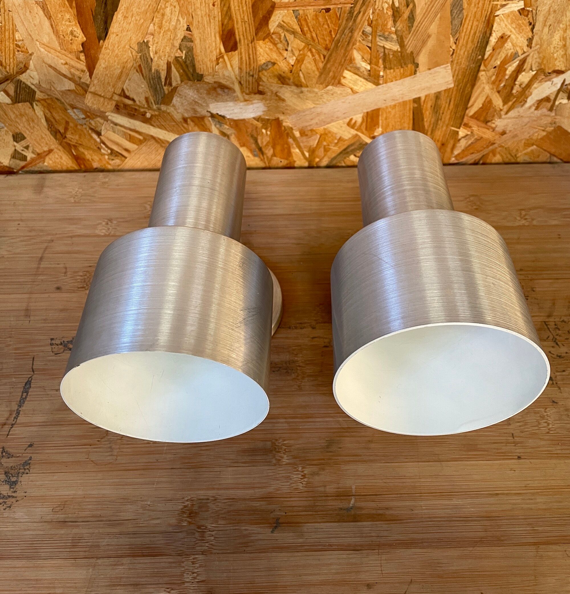 Pair of swivel brushed metal sconces