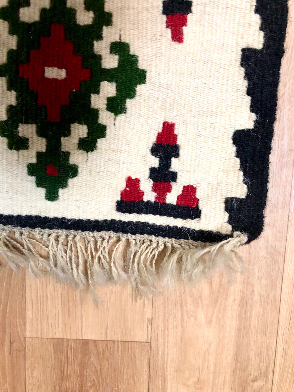 Small ethnic carpet