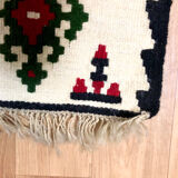 Small ethnic carpet