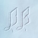 Old drape embroidered monogram initials D B