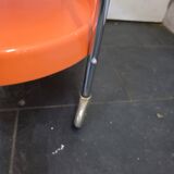 Orange rolling trolley from the 70s