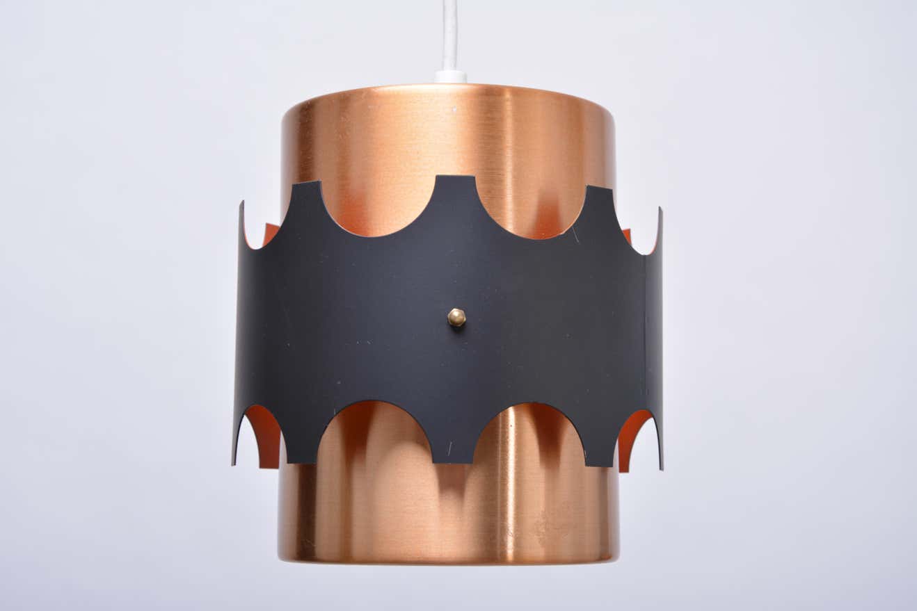 Set of two mid-century copper-colored German pendant lamps
