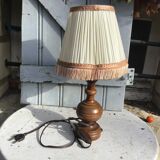 Turned wooden foot lamp with pleated lampshade