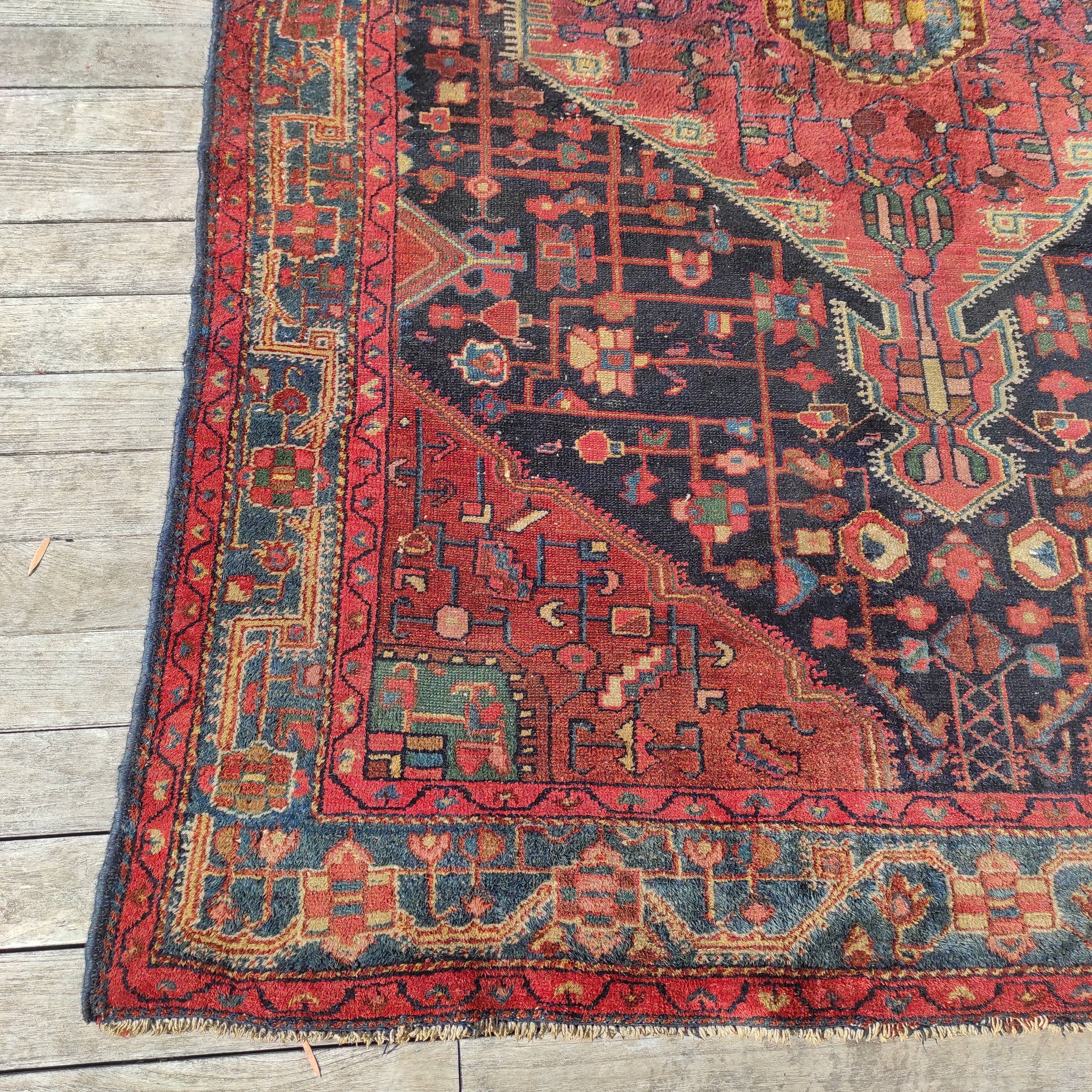 Old Persian carpet 1.62 m wide and 2.33 meters long