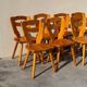 Set of 8 pine chairs in the Les Arcs design style by Charlotte Perriand from the 1970s.