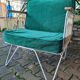 Fauteuil croisette en fer forgé avec coussins en velours vert