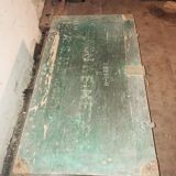 Green ammo chest with letters on it