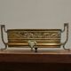 Neoclassical cache-pot in patinated brass, 19th century.