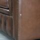 Fauteuil club Chesterfield en cuir de vachette marron de style anglais