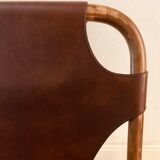 Pair of leather and bamboo armchairs