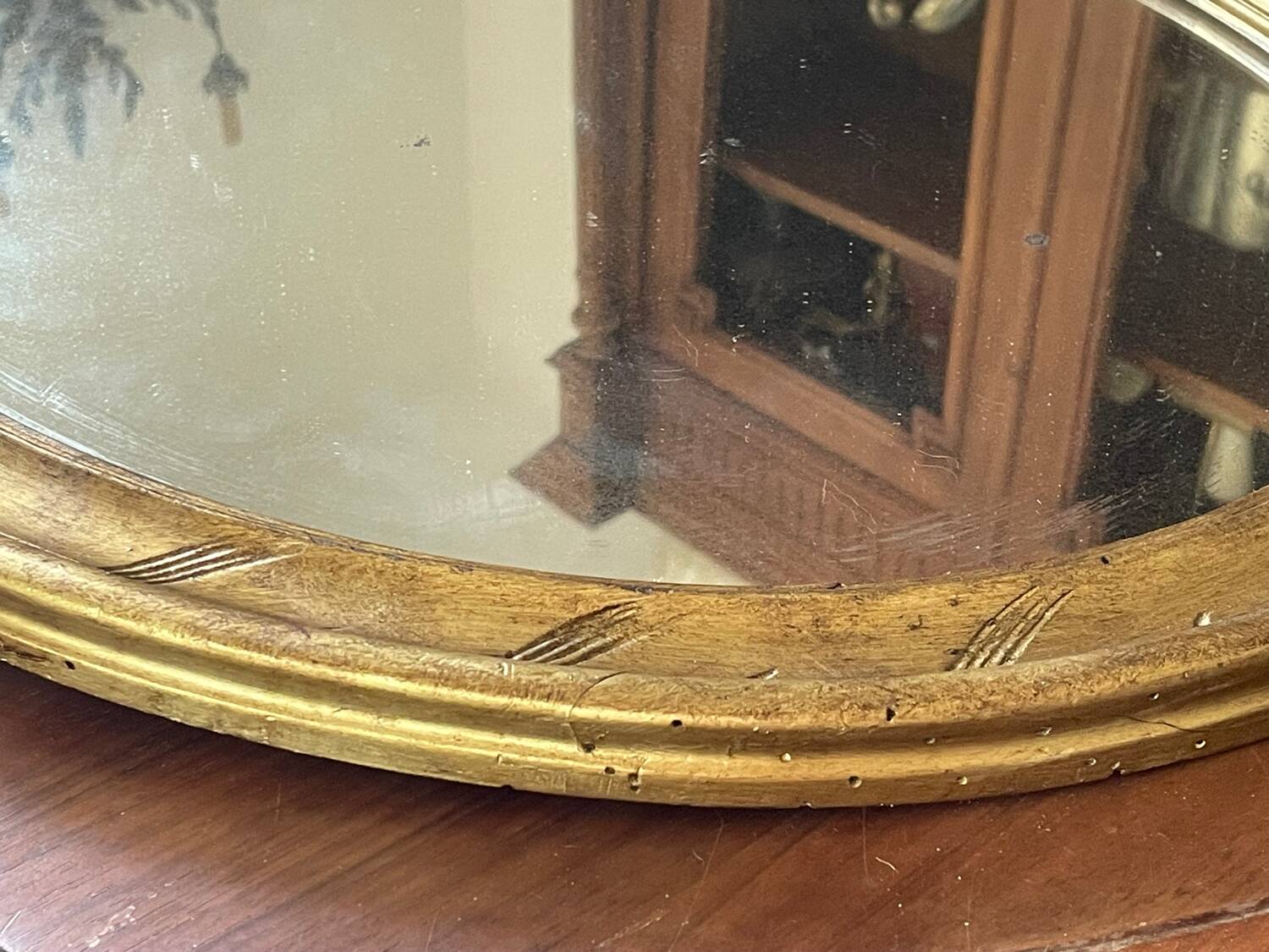 58cm patinated gilded wood mirror