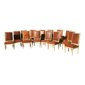 Suite de 14 chaises laquées style louis xvi